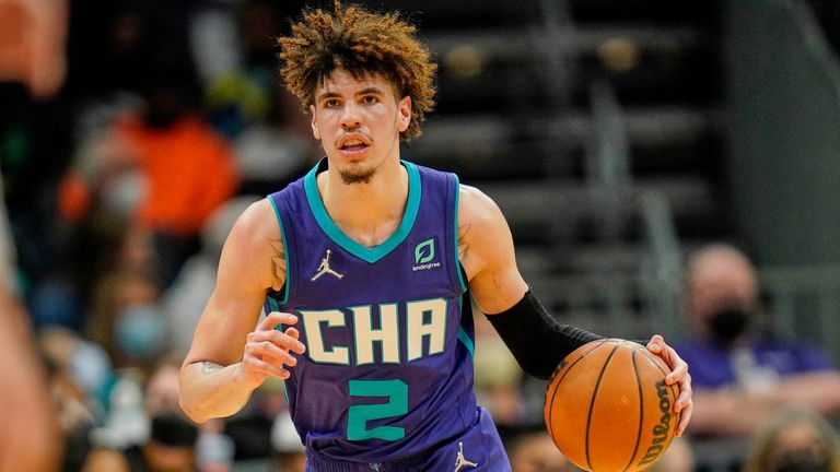 Charlotte Hornets guard LaMelo Ball puts the ball on court during an NBA basketball game against the Orlando Magic on Friday, January 14, 2022, in Charlotte, NC 