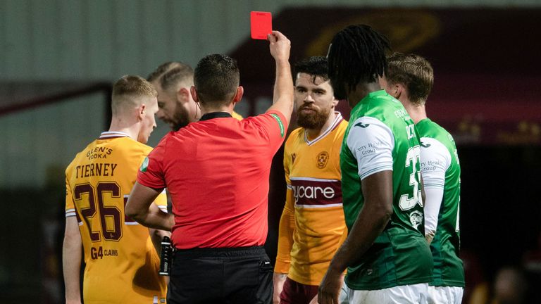 Motherwell&#39;s Liam Donnelly (centre) is sent off against Hibs