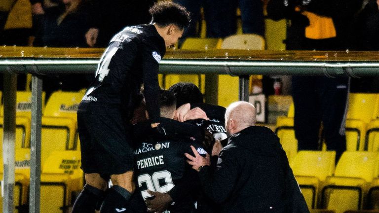 LIVINGSTON, SCOTLAND - JANAURY 18: Livingston celebrate after Bruce Anderson makes it 1-0 during a Cinch Premiership match between Livingston and Dundee at the Tony Macaroni Arena, on January 18, 2022, in Livingston, Scotland. (Photo by Mark Scates / SNS Group)