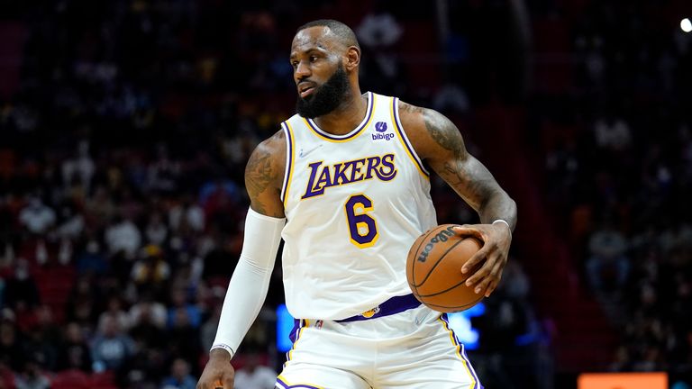 Los Angeles Lakers forward LeBron James is in action during the first half of an NBA basketball game against the Miami Heat
