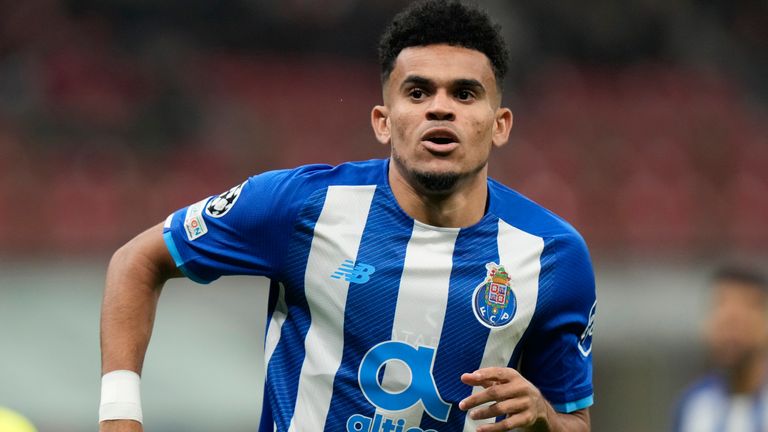 Porto's Luis Diaz celebrates after scoring during the Champions League group B soccer match between AC Milan and Porto at the San Siro stadium in Milan, Italy, Tuesday, Nov.3 , 2021. (AP Photo/Luca Bruno)