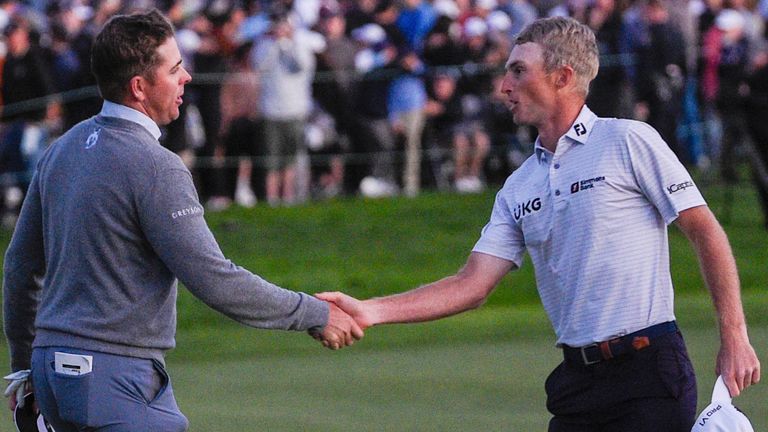 SAN DIEGO, CA - JANUARY 29: Luke List (USA) shakes hands with Will Zalatoris (USA) after winning the Farmers Insurance Open at Torrey Pines Golf Course on January 29, 2022 in La Jolla, CA. (Photo by Ken Murray/Icon Sportswire)