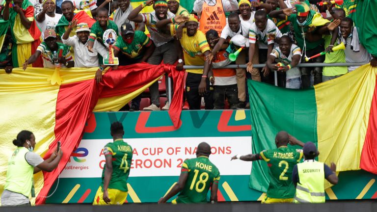 Mali's Ibrahima Kone celebrates scoring the opening goal against Gambia (AP)