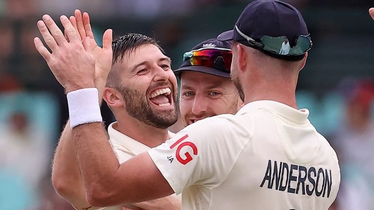 Mark Wood celebrates the wicket of Marnus Labuschagne at the SCG