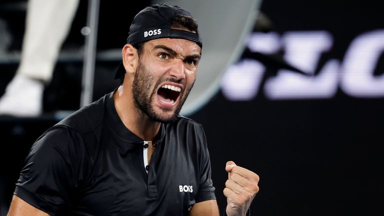 Matteo Berrettini of Italy reacts after winning a point against Gael Monfils of France during their quarterfinal match at the Australian Open tennis championships in Melbourne, Australia, Tuesday, Jan. 25, 2022. (AP Photo/Hamish Blair)