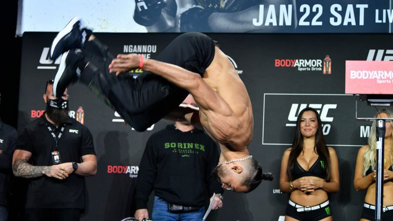 Michel Pereira of Brazil back flips off the scale during the UFC 270 ceremonial weigh-in at the Anaheim Convention Center on January 21, 2022 in Anaheim, California. (Photo by Chris Unger/Zuffa LLC)
