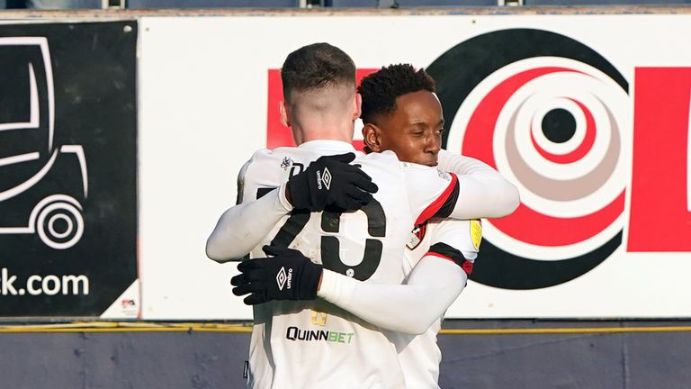 Morgan Rogers scores Bournemouth's second goal against Luton at Kenilworth Road.