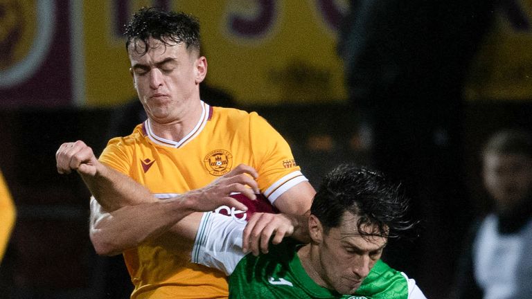 MOTHERWELL, SCOTLAND - JANUARY 26: Hibernian's Joe Newell (R) and Motherwell's Barry Maguire during a cinch Premiership match between Motherwell and Hibs at Fir Park, on January 26, 2022, in Motherwell, Scotland. (Photo by Craig Foy / SNS Group)