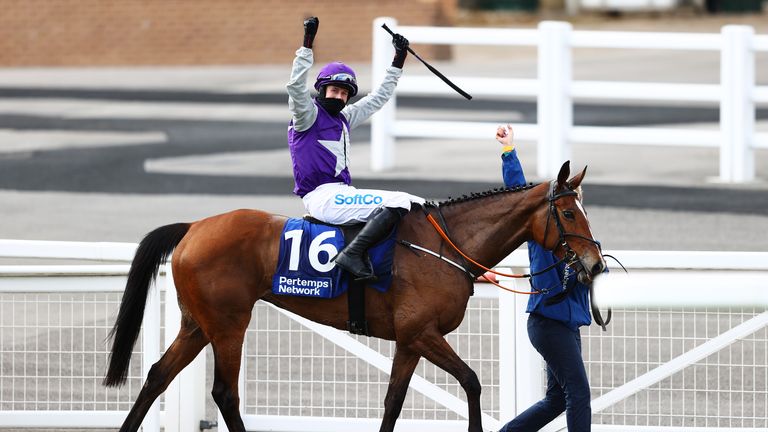 Brian Cooper celebrates as Mrs Milner is led back in at Cheltenham