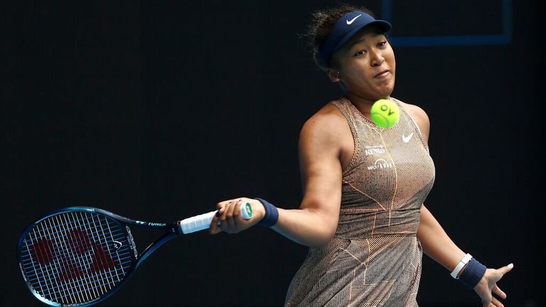 Naomi Osaka of Japan plays a forehand during their singles match against Alize Cornet of France at Summer Set tennis tournament ahead of the Australian Open in Melbourne, Australia, Tuesday, Jan. 4, 2022. (AP Photo/Hamish Blair)