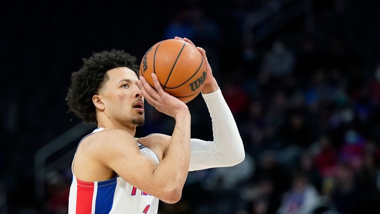 Detroit Pistons guard Cade Cunningham attempts a basket during the first half of an NBA basketball game against the Utah Jazz, Monday, Jan. 10, 2022, in Detroit. (AP Photo/Carlos Osorio)