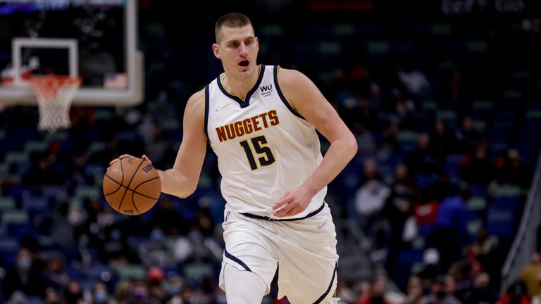 Denver Nuggets center Nikola Jokic (15) plays against the New Orleans Pelicans in the first quarter of an NBA basketball game in New Orleans, Friday, Jan. 28, 2022. (AP Photo/Derick Hingle)