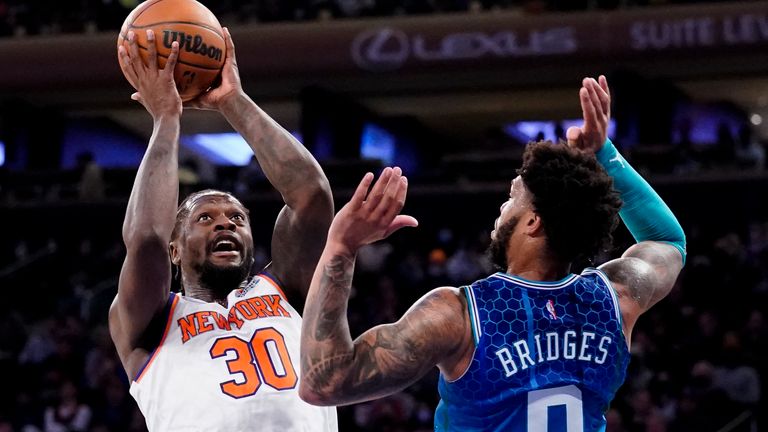 New York Knicks forward Julius Randle (30) shoots against Charlotte Hornets forward Miles Bridges (0) during the second half of an NBA basketball game, Monday, Jan. 17, 2022, in New York.