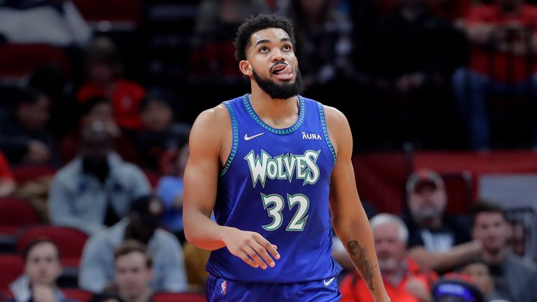 Minnesota Timberwolves center Karl-Anthony Towns (32) during the second half of an NBA basketball game against the Houston Rockets Sunday, Jan. 9, 2022, in Houston. (AP Photo/Michael Wyke)



