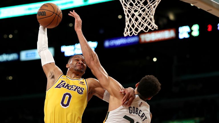 Russell Westbrook #0 of the Los Angeles Lakers dunks the ball against Rudy Gobert #27 of the Utah Jazz during the second quarter at Crypto.com Arena on January 17, 2022 in Los Angeles, California. 