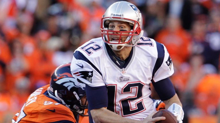 New England Patriots quarterback Tom Brady (12) is sacked by Denver Broncos defensive end Jeremy Mincey (57) during the second half of the AFC Championship NFL playoff football game in Denver, Sunday, Jan. 19, 2014. (AP Photo/Joe Mahoney)