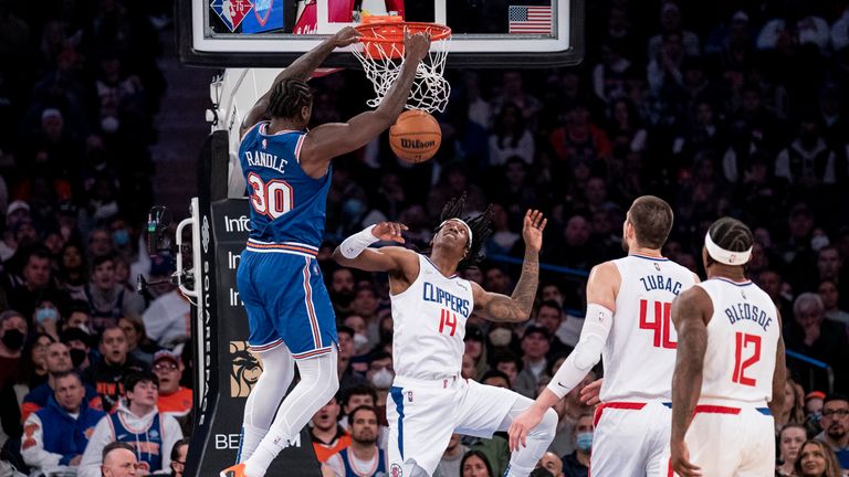 New York Knicks forward Julius Randle dunks on Los Angeles Clippers guard Terance Mann.