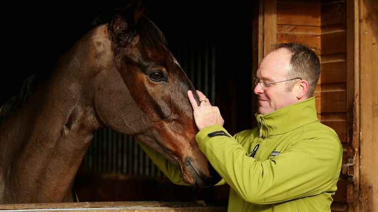 Newland with his 2014 Grand National winner Pineau De Re at home at his Worcestershire base