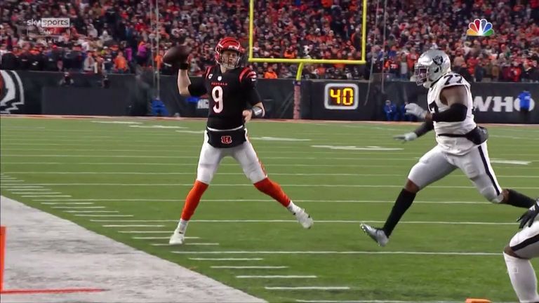 Joe Burrow releases the ball just before his momentum carries him out of bounds, with a wide-open Tyler Boyd perfectly-positioned to reel in the 10-yard touchdown for the Cincinnati Bengals against the Las Vegas Raiders.