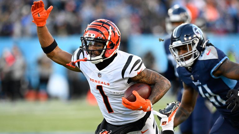 Cincinnati Bengals wide receiver Ja&#39;Marr Chase (1) runs against the Tennessee Titans during the first half of an NFL divisional round playoff football game, Saturday, Jan. 22, 2022, in Nashville, Tenn.