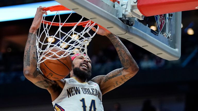 [07:56] Rossiter, Daniel (Senior Assistant Producer)
New Orleans Pelicans forward Brandon Ingram (14) slam dunks over Phoenix Suns forward Cameron Johnson (23) in the first half of an NBA basketball game in New Orleans, Tuesday, Jan. 4, 2022.