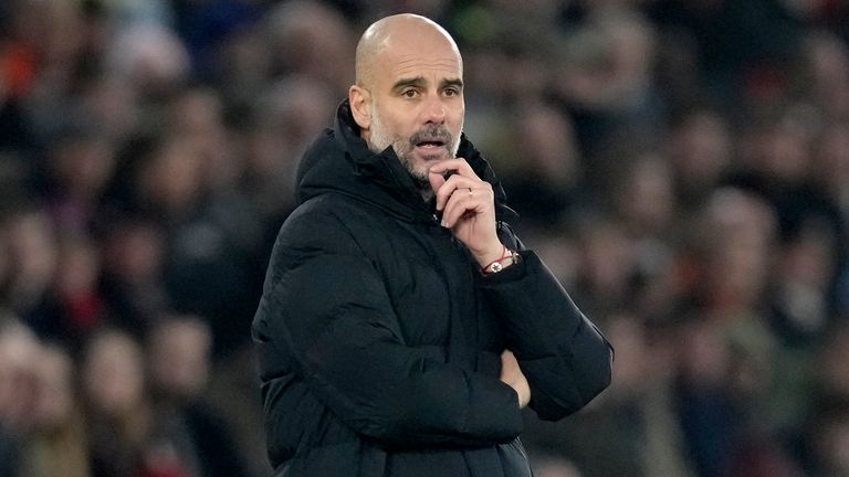 Pep Guardiola looks on with Man City 1-0 down in the first half (AP)