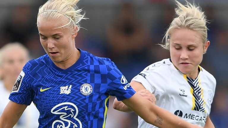 KINGSTON UPON THAMES, ENGLAND - SEPTEMBER 12: Pernille Harder of Chelsea is challenged by Izzy Christiansen of Everton during the Barclays FA Women&#39;s Super League match between Chelsea Women and Everton Women at Kingsmeadow on September 12, 2021 in Kingston upon Thames, England. (Photo by Harriet Lander - Chelsea FC/Chelsea FC via Getty Images)