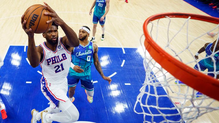 Philadelphia 76ers' Joel Embiid goes up for the shot against Charlotte Hornets' Miles Bridges 