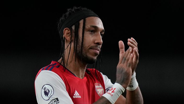 Arsenal...s Pierre-Emerick Aubameyang applauds fans during the English Premier League soccer match between Arsenal and Crystal Palace at the Emirates stadium in London, Monday Oct. 18, 2021.(AP Photo/Alastair Grant).. 