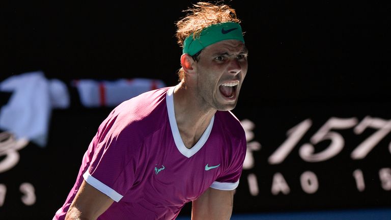 Rafael Nadal of Spain celebrates after defeating Yannick Hanfmann of Germany in their second round match at the Australian Open tennis championships in Melbourne, Australia, Wednesday, Jan. 19, 2022. (AP Photo/Andy Brownbill)