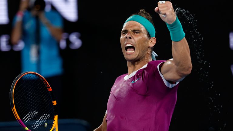 Rafael Nadal of Spain reacts after winning a point against Daniil Medvedev of Russia in the men...s singles final at the Australian Open tennis championships in Melbourne, Australia, Sunday, Jan. 30, 2022.(AP Photo/Hamish Blair)