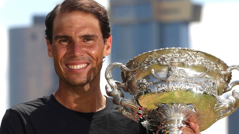 2022 Men's Singles Champion, Rafael Nadal of Spain with the trophy at Government House after the Australian Open in Melbourne, Australia, Monday, Jan. 31, 2022.   (AP Photo/Hamish Blair)