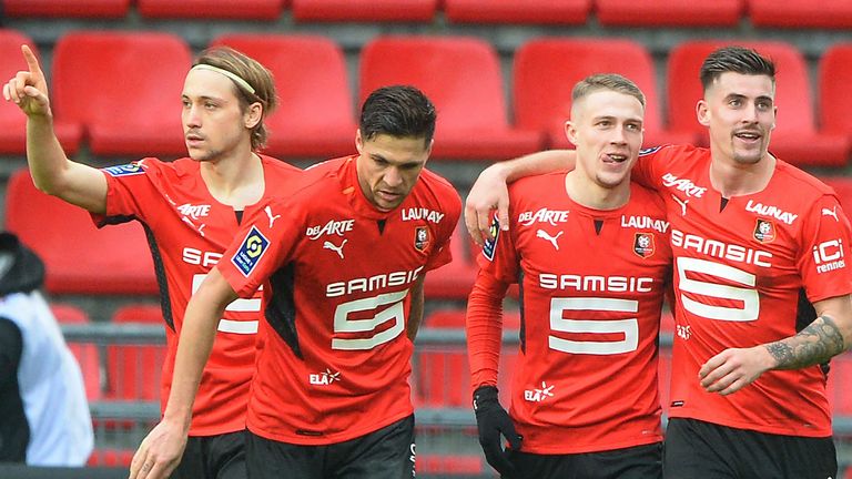 Adrien Truffert is congratulated after scoring for Rennes