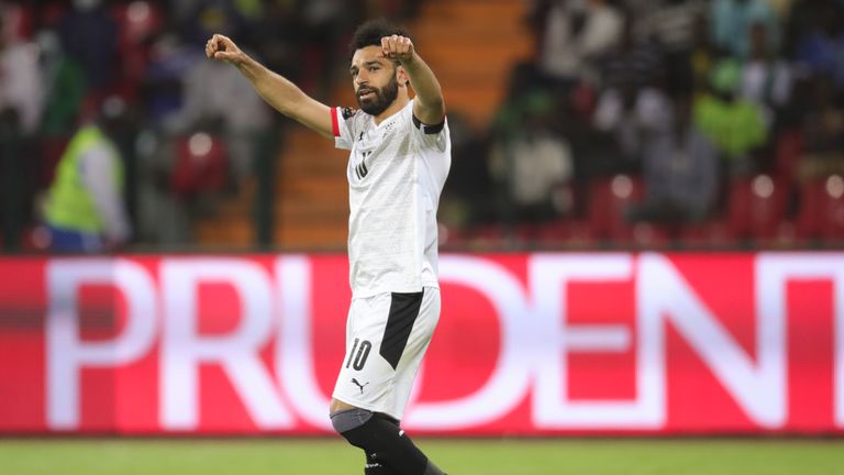 Egypt's Mohamed Salah celebrates after the African Cup of Nations Group D soccer match between Egypt and Guinea-Bissau in Garoua, Cameroon, Saturday, Jan. 15, 2022. 