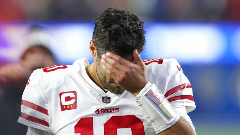 San Francisco 49ers&#39; Jimmy Garoppolo walks off the field after the NFC Championship NFL football game against the Los Angeles Rams Sunday, Jan. 30, 2022, in Inglewood, Calif. The Rams won 20-17 to advance to the Super Bowl. (AP Photo/Jed Jacobsohn)