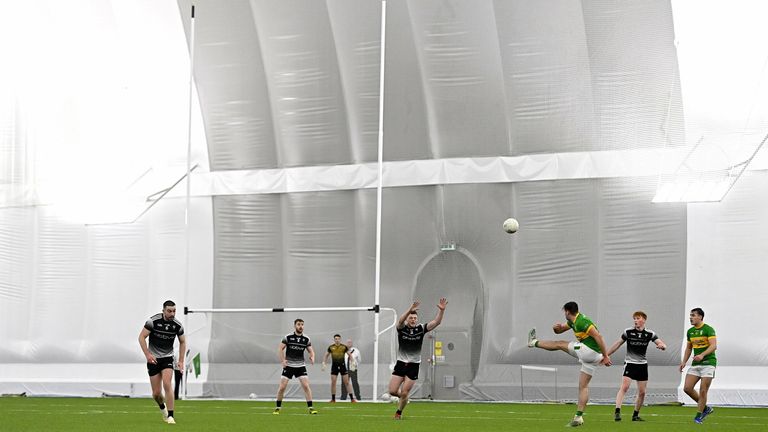 3 January 2022; Cillian McGloin of Leitrim kicks a point during the Connacht FBD League Preliminary Round match between Leitrim and Sligo at the NUI Galway Connacht GAA Air Dome in Bekan, Mayo. Photo by Ramsey Cardy/Sportsfile