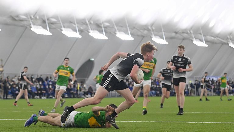 3 January 2022; Evan Lyons of Sligo in action against Darragh Rooney of Leitrim during the Connacht FBD League Preliminary Round match between Leitrim and Sligo at the NUI Galway Connacht GAA Air Dome in Bekan, Mayo. Photo by Ramsey Cardy/Sportsfile
