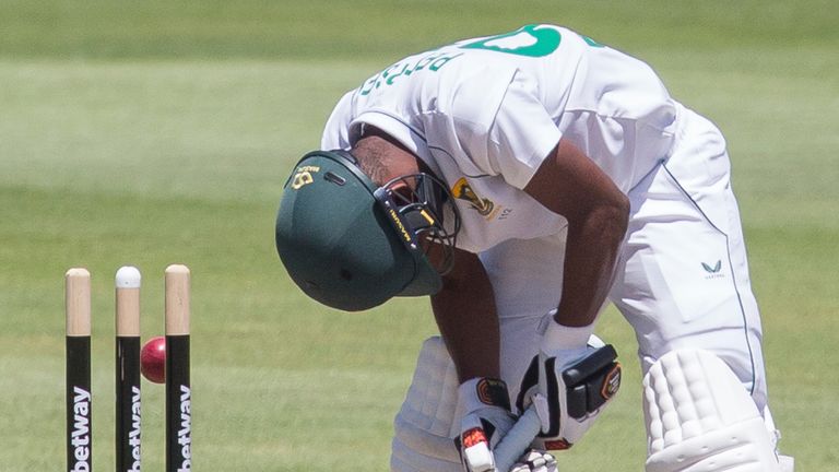Keegan Peterson hangs his head in disappointment after he is bowled out by Indian bowler Shardul Thakur during the fourth day of the third and final test match