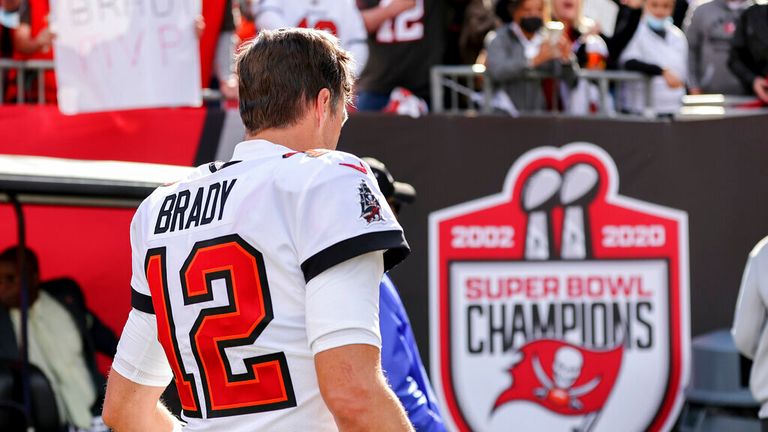 Tampa Bay Buccaneers quarterback Tom Brady (12) walks off the field during a NFL divisional playoff football game between the Los Angeles Rams and Tampa Bay Buccaneers, Sunday, January 23, 2022 in Tampa, Fla. (AP Photo/Alex Menendez)