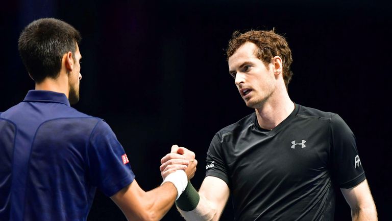 World No. 1 Andy Murray of Britain (R) clasps hands with No. 2 ranked Novak Djokovic of Serbia after securing the ATP World Tour Finals title with a 6-3, 6-4 win in London on Nov. 20, 2016. (Kyodo via AP Images)==Kyodo


