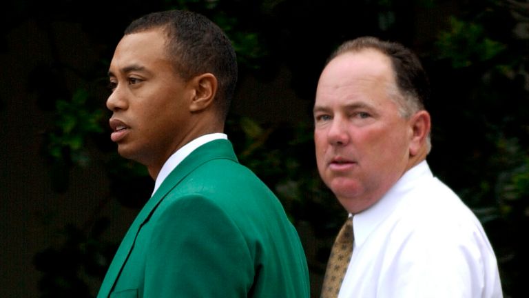Defending Masters Champion Tiger Woods, left, and 1998 Masters Champion Mark O'Meara, right, arrive at the Augusta National Golf Club for the annual Champions dinner at the 2002 Masters, Tuesday,  April 9, 2002, in Augusta, Ga. (AP Photo/Dave Martin)