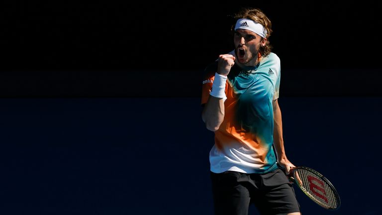 Stefanos Tsitsipas of Greece reacts after winning a point against Benoit Paire of France during their third round match at the Australian Open tennis championships in Melbourne, Australia, Saturday, Jan. 22, 2022. (AP Photo/Hamish Blair)