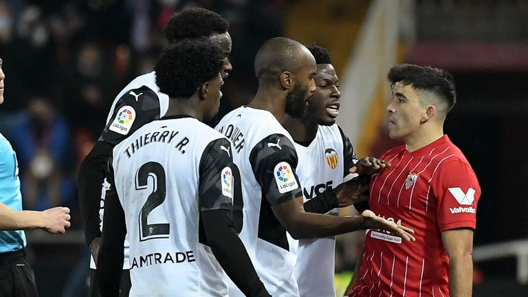 10-man Valencia held Sevilla to a 1-1 draw in La Liga