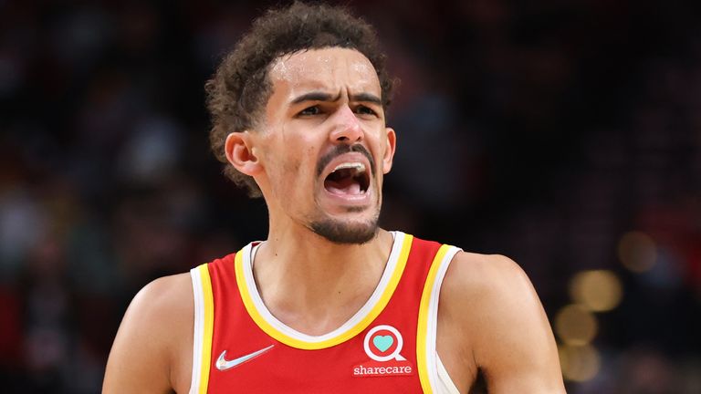 Trae Young #11 of the Atlanta Hawks reacts during the third quarter against the Portland Trail Blazers at Moda Center on January 03, 2022 in Portland, Oregon. 