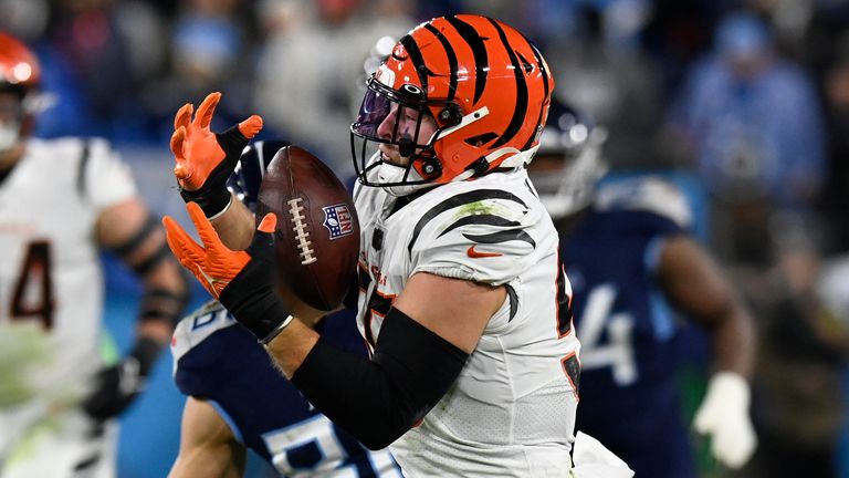 Cincinnati Bengals linebacker Logan Wilson (55) intercepts the ball against the Tennessee Titans during the second half of an NFL divisional round playoff football game, Saturday, Jan. 22, 2022, in Nashville, Tenn.