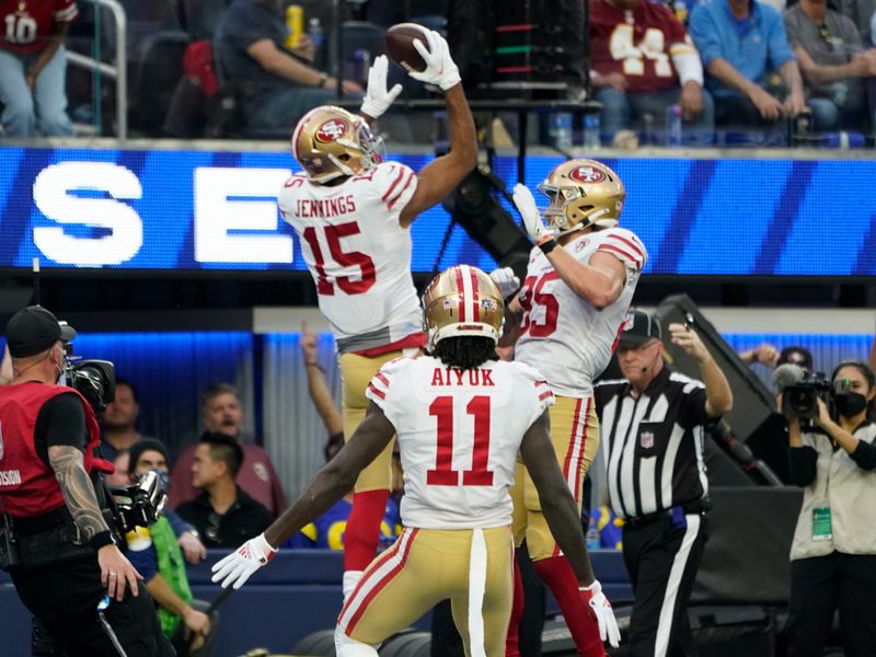 The San Francisco 49ers clinched a playoff spot with a 27-24 overtime  victory over the NFC West champion Los Angeles Rams on Sunday thanks to  Robbie Gould's 24-yard field goal with 2:45