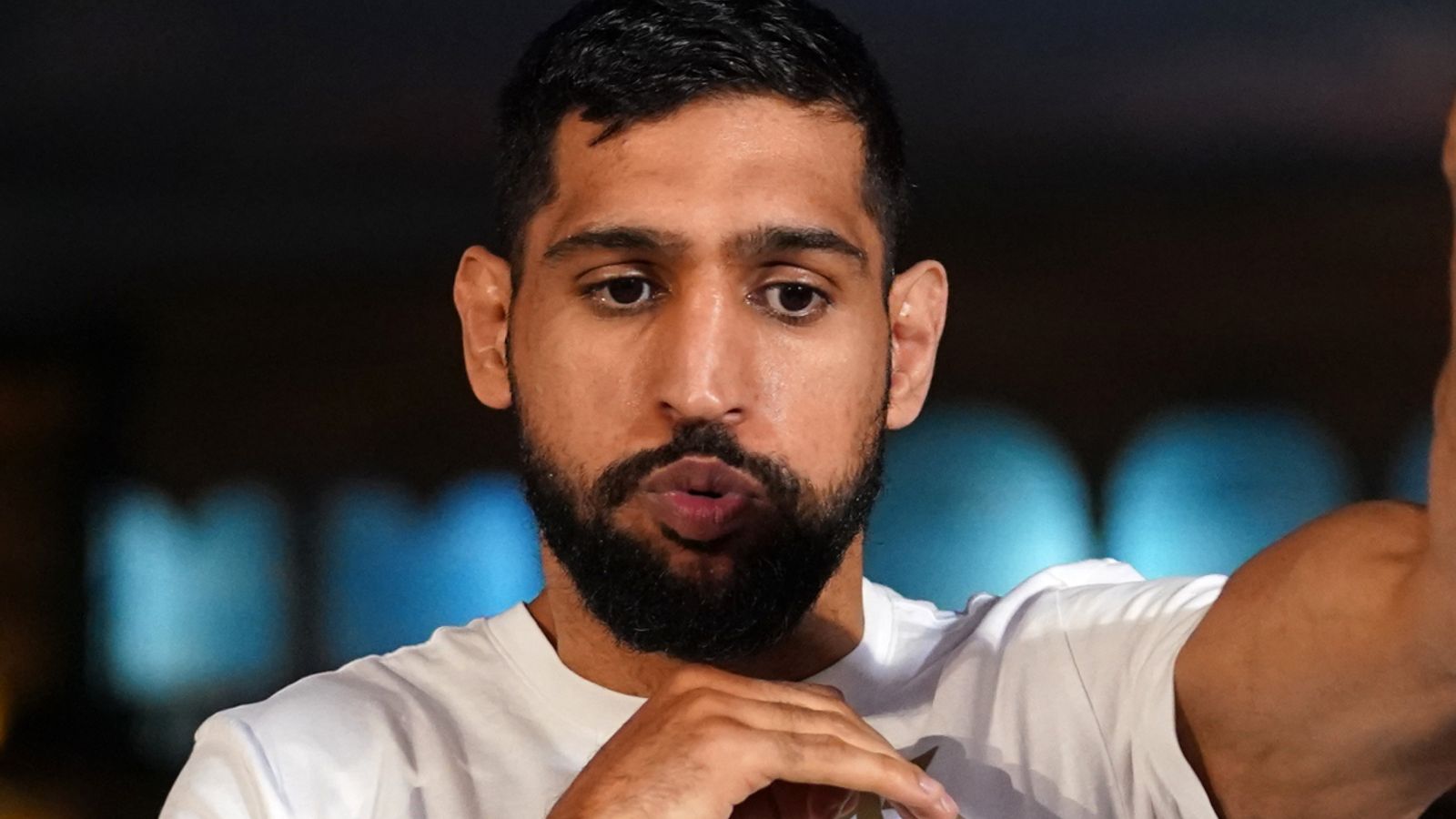 Did Amir Khan’s trainer give away his tactics to Kell Brook during a heated press conference exchange?