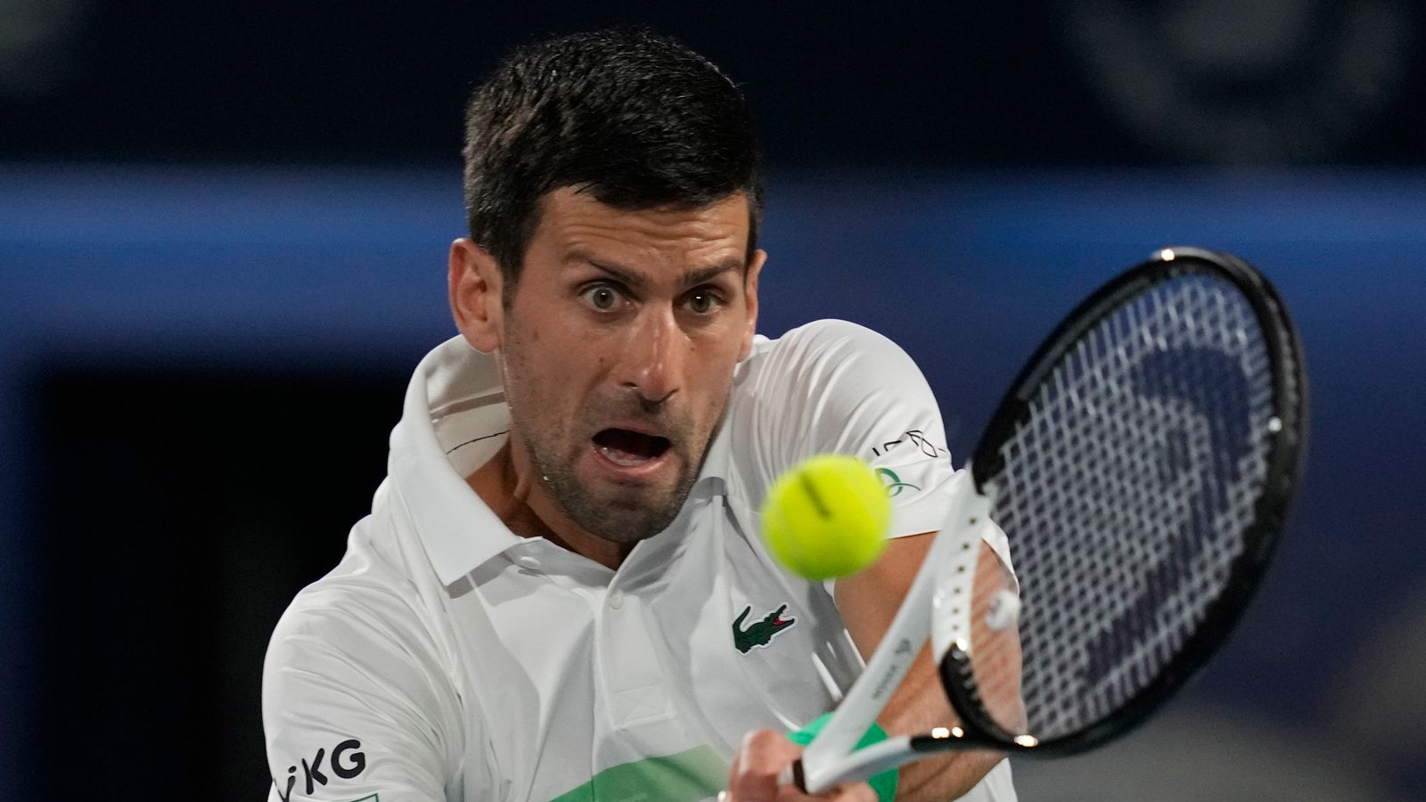 Novak Djokovic in action at Dubai Duty Free Tennis Championships versus