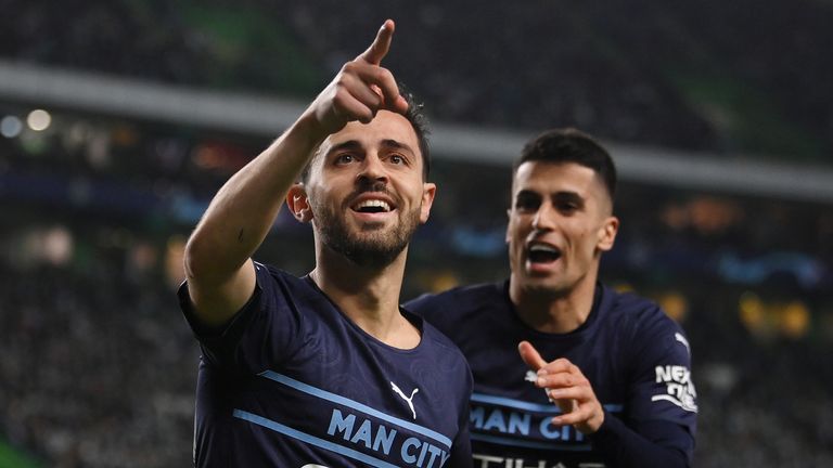 Bernardo Silva celebrates with Joao Cancelo against Sporting Lisbon