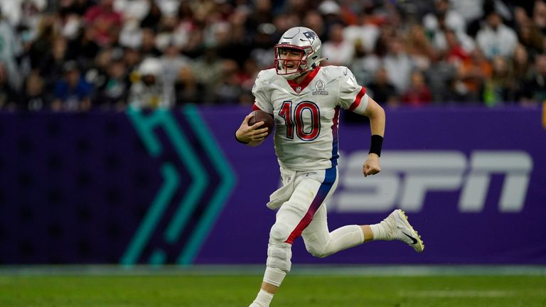 AFC quarterback Mac Jones of the New England Patriots (10) runs the ball up the field during the Pro Bowl NFL football game against the NFC, Sunday, Feb. 6, 2022, in Las Vegas.